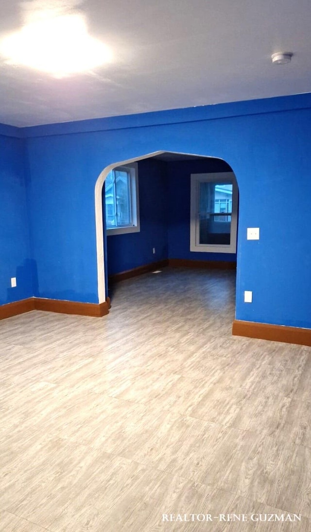 empty room featuring hardwood / wood-style floors