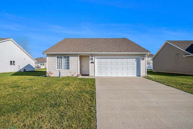 view of front of home featuring a front yard, a garage, and central AC unit