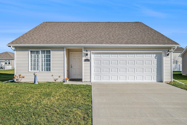 single story home featuring a garage and a front lawn