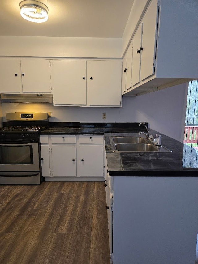 kitchen with white cabinets, sink, dark wood-type flooring, and stainless steel range with gas stovetop