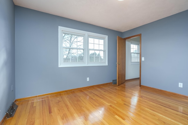 empty room featuring light wood-type flooring