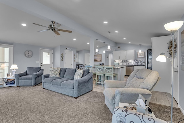 11767 Greenbriar Dr, Jerome, MI 49249 - living area with lofted ceiling, a ceiling fan, and recessed lighting