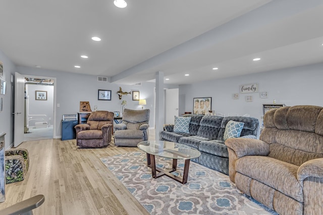 11767 Greenbriar Dr, Jerome, MI 49249 - living room with light wood finished floors and recessed lighting