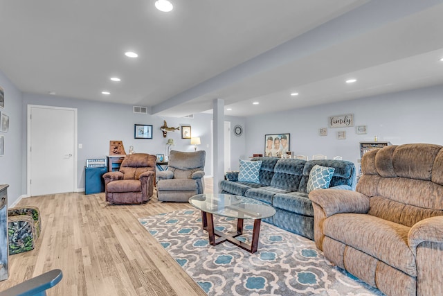 living room with light hardwood / wood-style floors