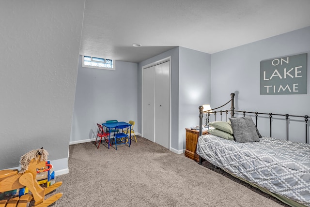 carpeted bedroom with a closet