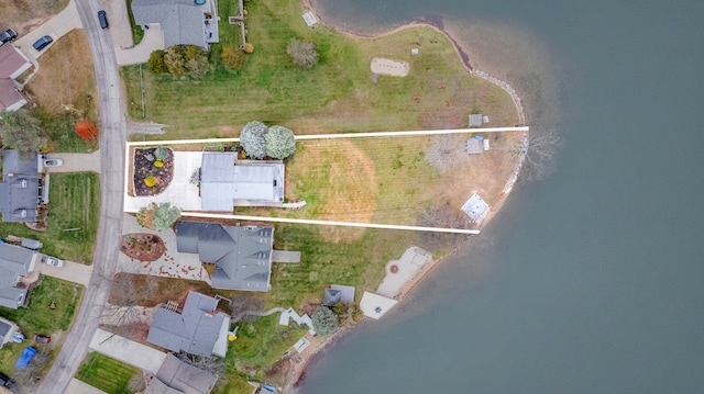 drone / aerial view featuring a water view