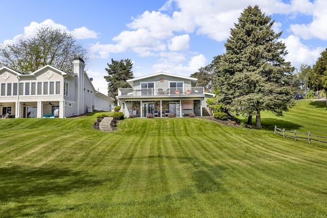 11767 Greenbriar Dr, Jerome, MI 49249 - rear view of house with a yard, stairs, and a deck