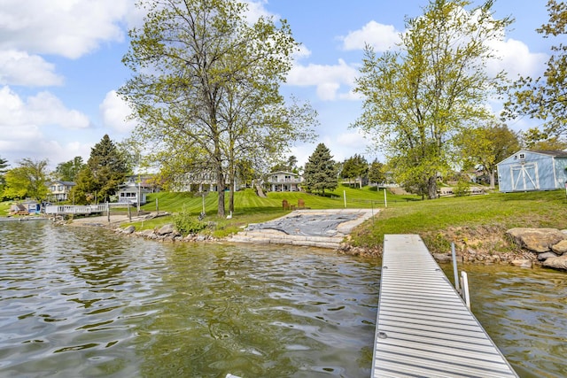 11767 Greenbriar Dr, Jerome, MI 49249 - dock with a yard and a water view