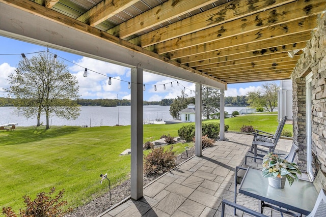 11767 Greenbriar Dr, Jerome, MI 49249 - view of patio featuring a water view