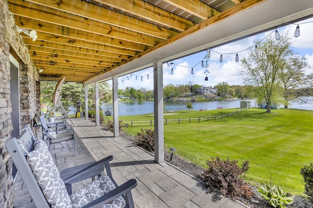 11767 Greenbriar Dr, Jerome, MI 49249 - view of patio featuring a water view