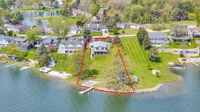 11767 Greenbriar Dr, Jerome, MI 49249 - aerial perspective of suburban area featuring property parcel outlined and a nearby body of water