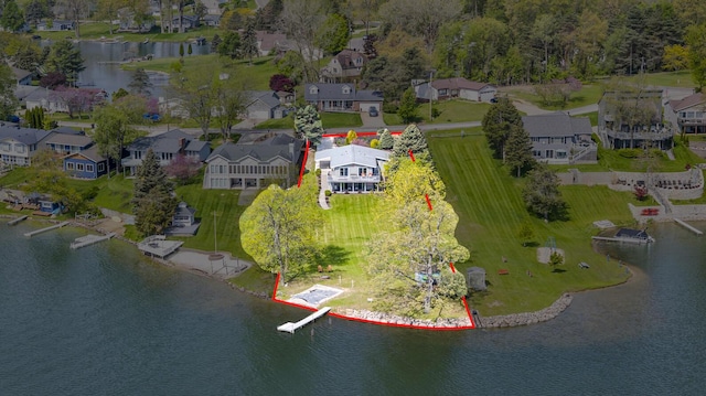 11767 Greenbriar Dr, Jerome, MI 49249 - aerial view of property and surrounding area with a nearby body of water, property boundaries highlighted, and nearby suburban area