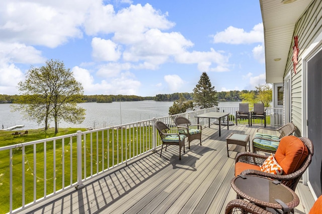 11767 Greenbriar Dr, Jerome, MI 49249 - wooden terrace featuring a water view and a lawn