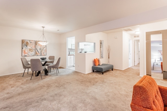 view of carpeted dining space