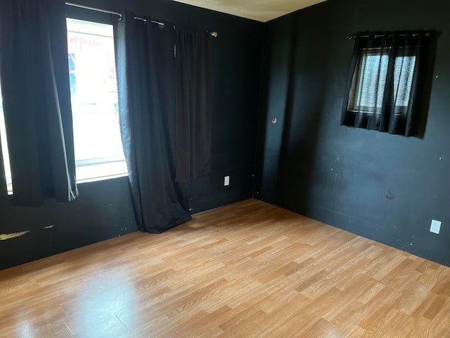 spare room featuring light hardwood / wood-style floors