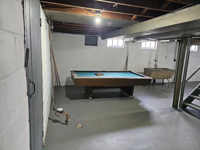 game room with sink, concrete flooring, and pool table