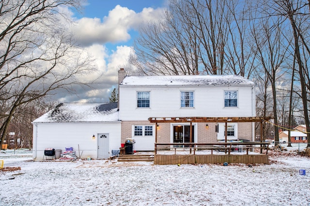 view of snow covered house