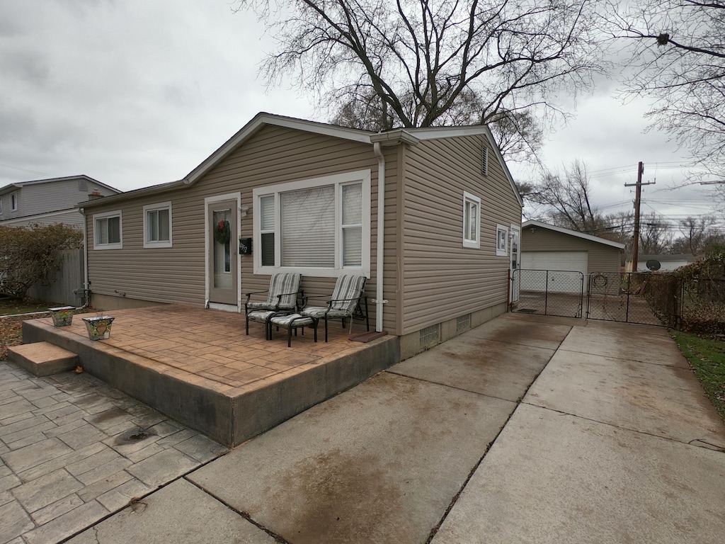 back of property featuring a patio area