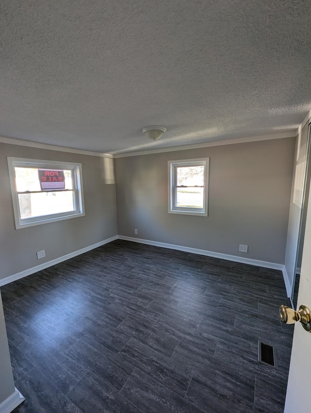 3683 Chestnut St, Clarkston, MI 48348 - empty room with ornamental molding, a textured ceiling, dark wood-type flooring, and baseboards