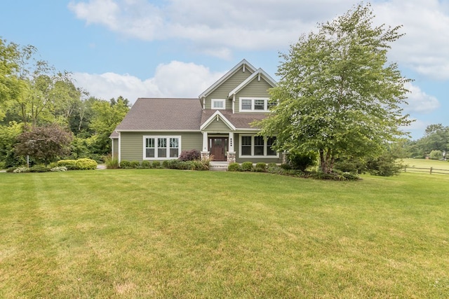 view of front of property with a front lawn