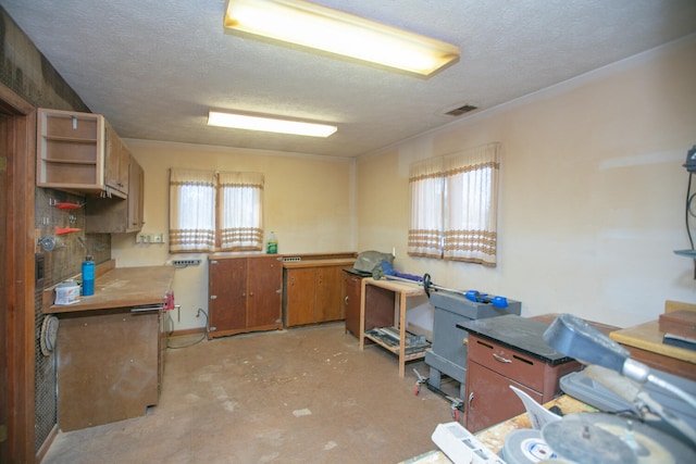 kitchen featuring a textured ceiling