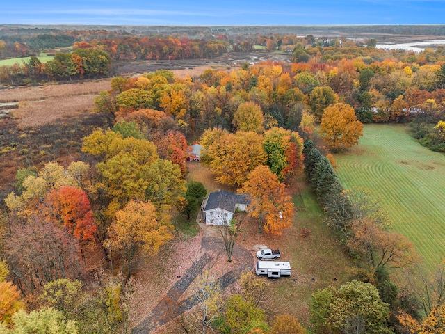 birds eye view of property with a rural view