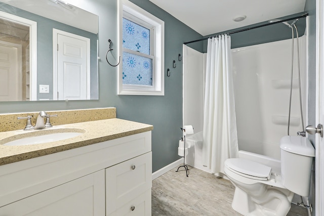 bathroom featuring hardwood / wood-style floors, vanity, and toilet