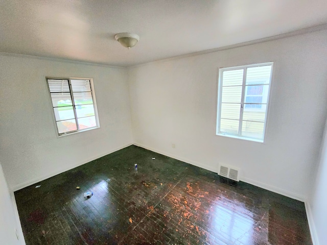 spare room featuring dark wood-type flooring