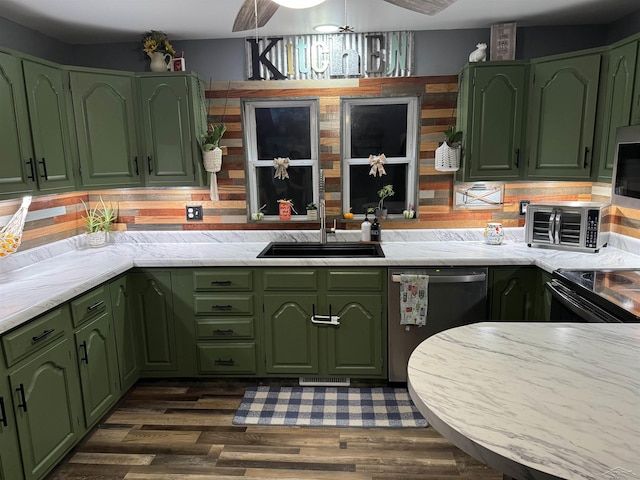 518 W Belle Ave, Saint Charles, MI 48655 - kitchen featuring green cabinetry, dishwasher, a sink, dark wood finished floors, and black range with electric stovetop