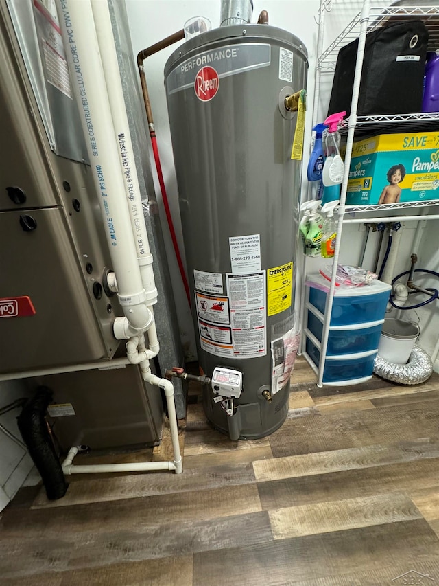 utility room with water heater