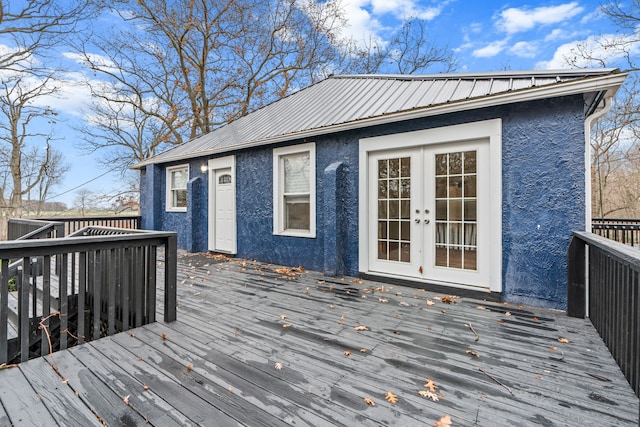 3897 Sand Rd, Port Austin, MI 48467 - wooden deck with french doors