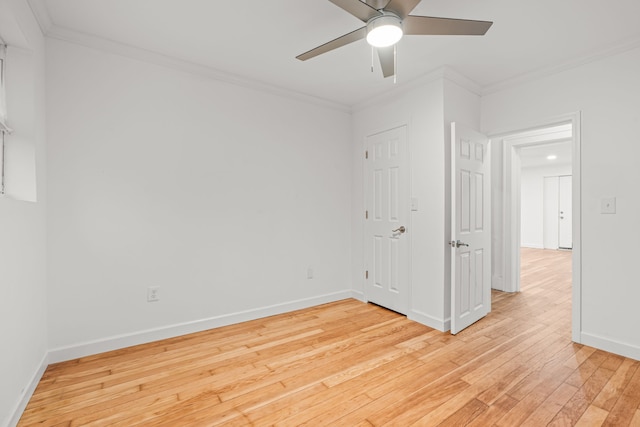 3897 Sand Rd, Port Austin, MI 48467 - unfurnished room with crown molding, ceiling fan, light wood-style floors, and baseboards