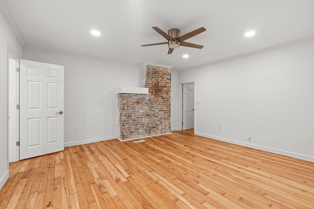 3897 Sand Rd, Port Austin, MI 48467 - unfurnished living room with a ceiling fan, light wood-type flooring, crown molding, baseboards, and recessed lighting