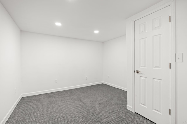3897 Sand Rd, Port Austin, MI 48467 - spare room featuring dark carpet, recessed lighting, and baseboards