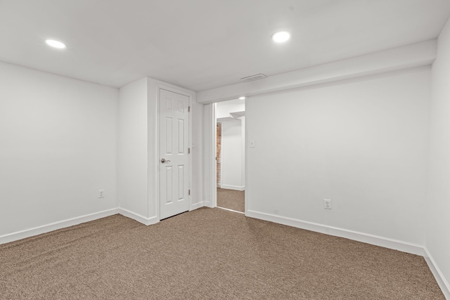 3897 Sand Rd, Port Austin, MI 48467 - spare room with recessed lighting, dark carpet, and baseboards