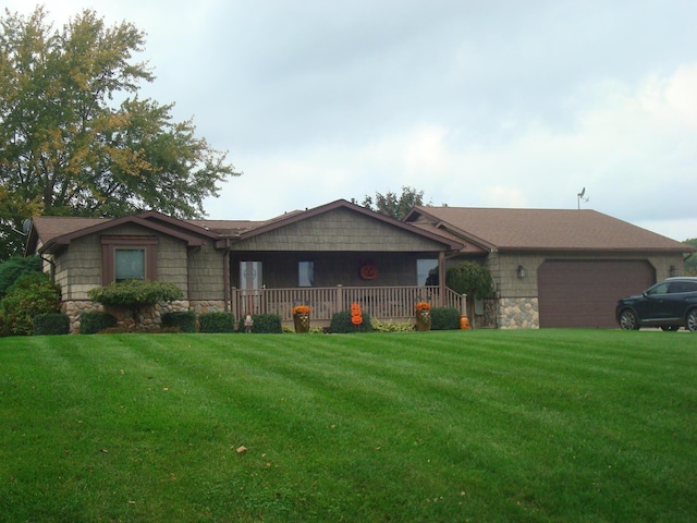 14600 W Diane Dr, Camden, MI 49232 - ranch-style home with stone siding, a garage, and a front lawn
