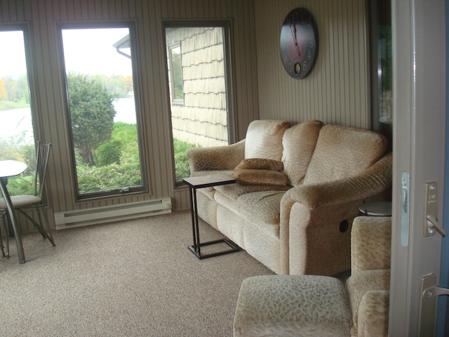 carpeted living room with a baseboard radiator