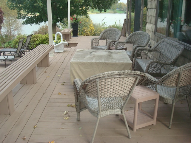 deck featuring a water view