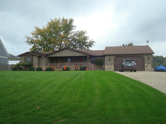 ranch-style home with a garage and a front yard