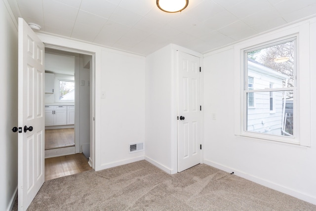 7641 Westminster Ave, Warren, MI 48091 - carpeted spare room featuring baseboards and a smoke detector