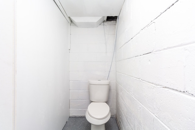 bathroom featuring toilet