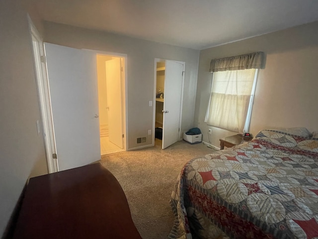 bedroom with light carpet