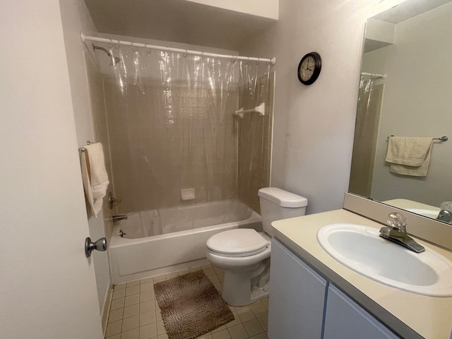 full bathroom with tile patterned floors, shower / tub combo with curtain, vanity, and toilet