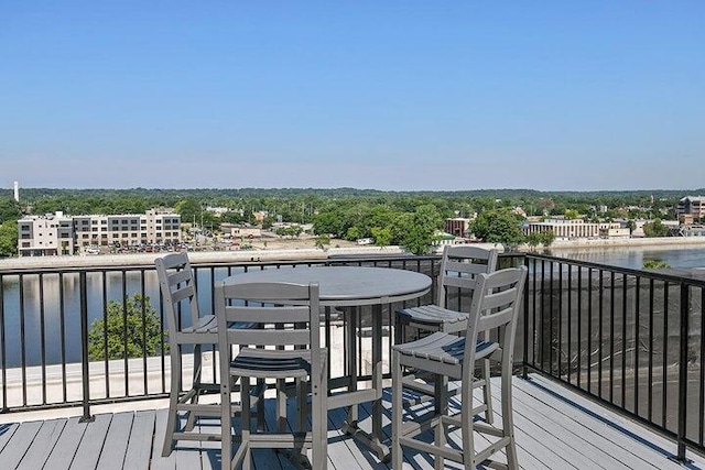 deck featuring a water view