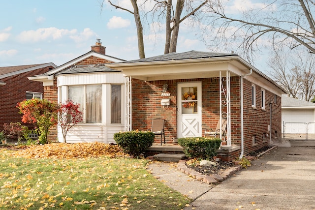 view of front of house featuring an outbuilding and a garage