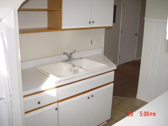 bathroom with vanity and tile patterned floors