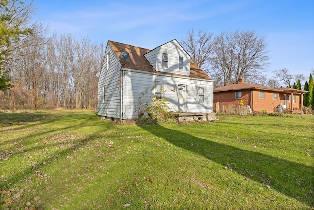 25370 Mary St, Taylor, MI 48180 - view of side of home featuring a lawn