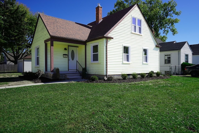 view of front facade with a front yard