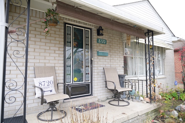 view of patio featuring a porch