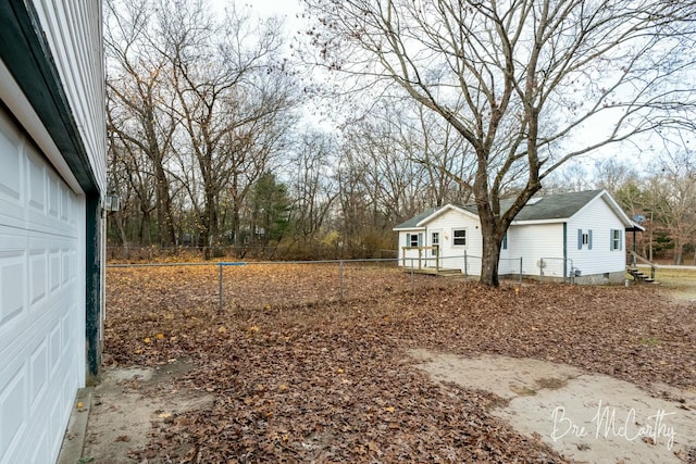 view of yard with a garage